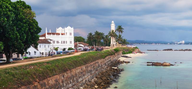 Panoramic view of the white lighthouse in Galle fort, Sri Lanka where we offer day tours and guided 